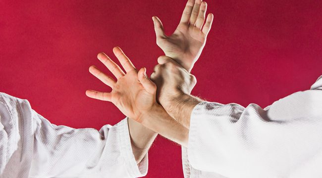 two-men-fighting-aikido-training-martial-arts